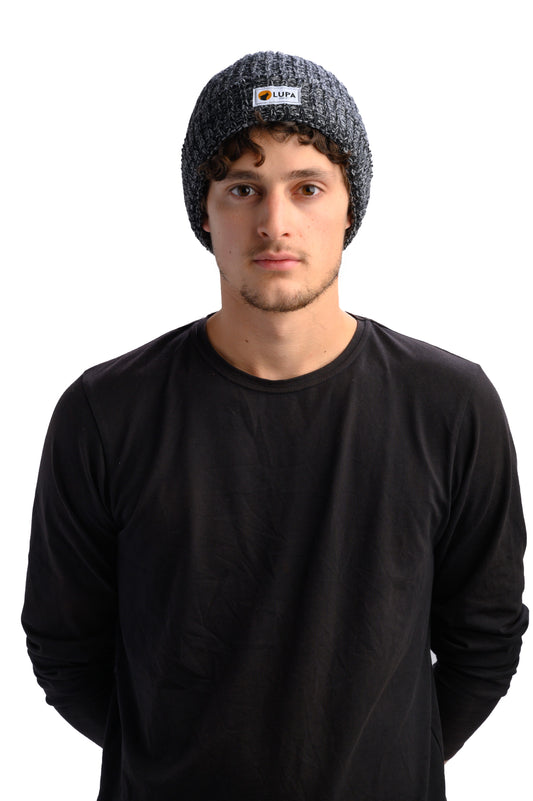 A man wearing lupa made in canada beanie